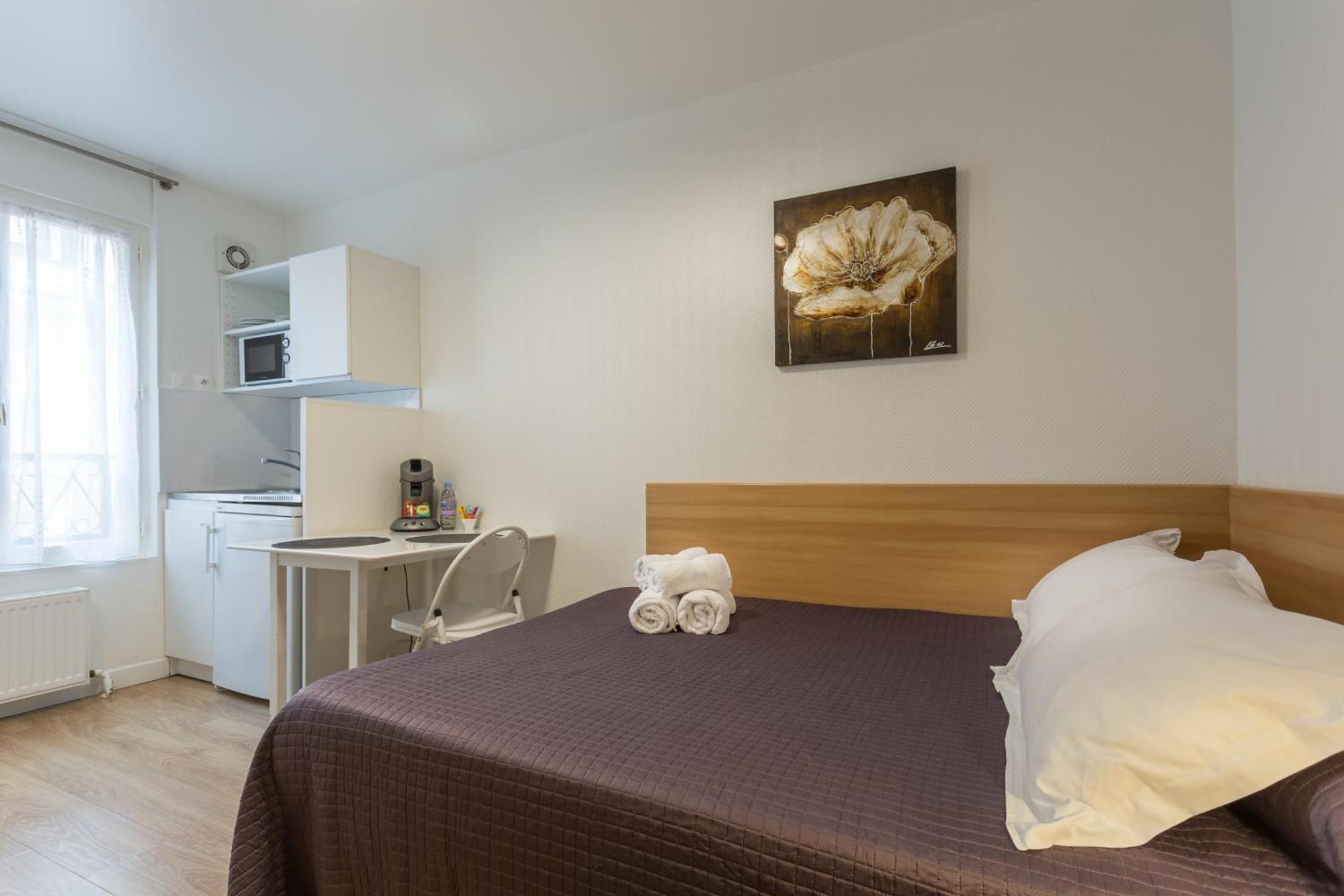Hotel De L'Horloge París Habitación foto